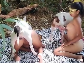 Steamy broads make out in outdoor and try dog sex